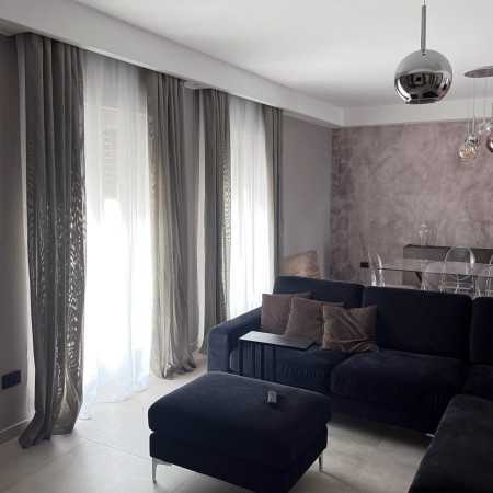 ATENA A PARETE CON STAFFE